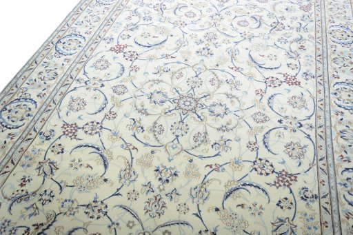 Backside of handmade New Nain rug showing knot structure and weave density