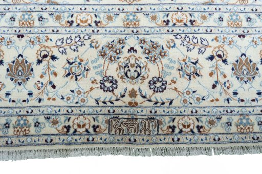 Corner detail of New Nain rug showing border pattern and Wool pile