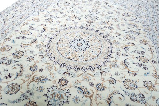 Backside of handmade New Nain rug showing knot structure and weave density