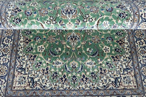 Close-up detail of New Nain rug from Iran / Persia showing Cork weave