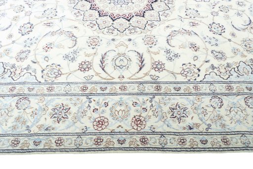 Corner detail of New Nain rug showing border pattern and Wool pile