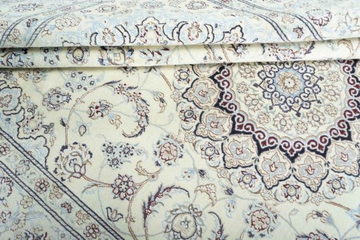 Close-up detail of New Nain rug from Iran / Persia showing Wool weave