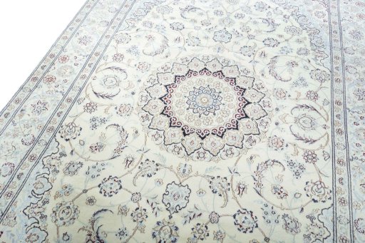 Backside of handmade New Nain rug showing knot structure and weave density