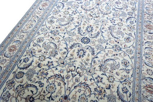 Backside of handmade New Nain rug showing knot structure and weave density