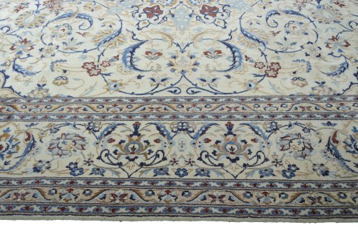 Corner detail of New Nain rug showing border pattern and Wool pile