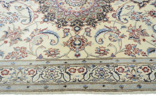 Corner detail of New Nain rug showing border pattern and Wool pile