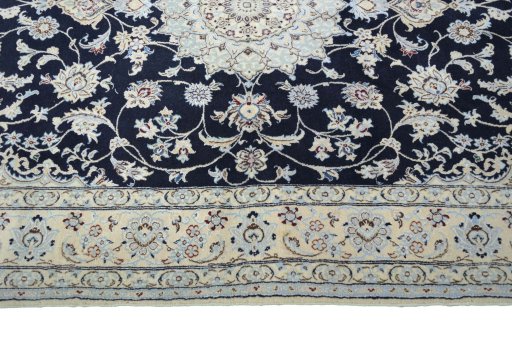 Corner detail of New Nain rug showing border pattern and Cork pile