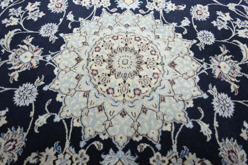 Central medallion detail of New Nain rug from Iran / Persia