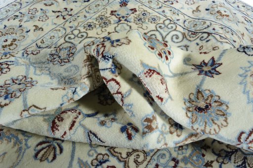 Surface texture of 2000s Nain rug with natural Wool and intricate pattern