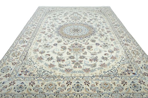 Surface texture of 2000s Nain rug with natural Wool and intricate pattern