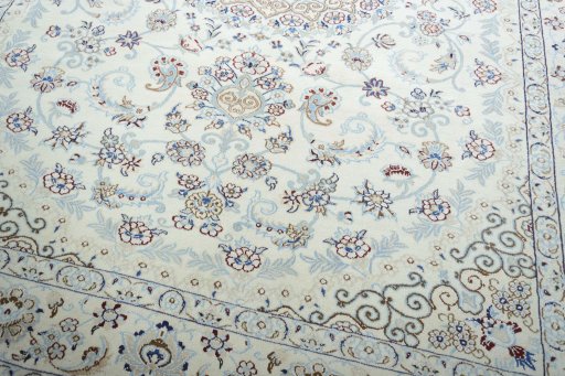 Close-up detail of 2000s Nain rug from Iran / Persia showing Wool weave