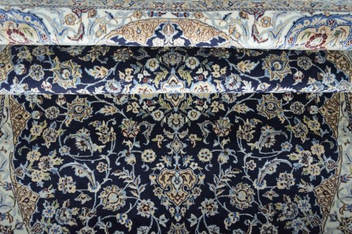 Close-up detail of 2000s Nain rug from Iran / Persia showing Cork weave