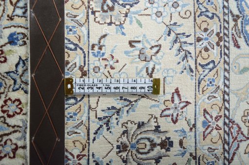 Backside of handmade 2000s Nain rug showing knot structure and weave density