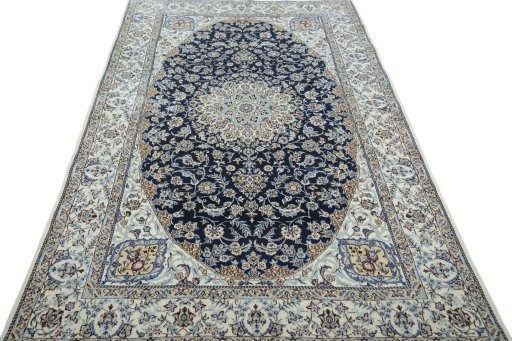 Surface texture of 2000s Nain rug with natural Cork and intricate pattern