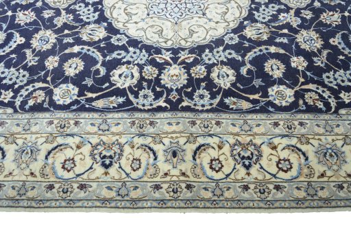 Corner detail of New Nain rug showing border pattern and Cork pile