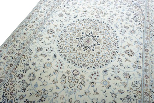 Backside of handmade New Nain rug showing knot structure and weave density