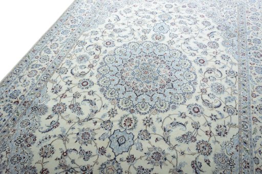 Backside of handmade New Nain rug showing knot structure and weave density