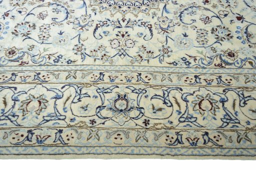 Corner detail of New Nain rug showing border pattern and Wool pile