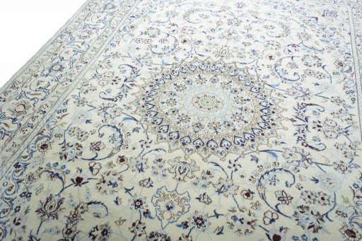 Backside of handmade New Nain rug showing knot structure and weave density