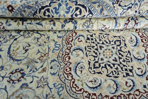 Close-up detail of 2000s Nain rug from Iran / Persia showing Wool weave