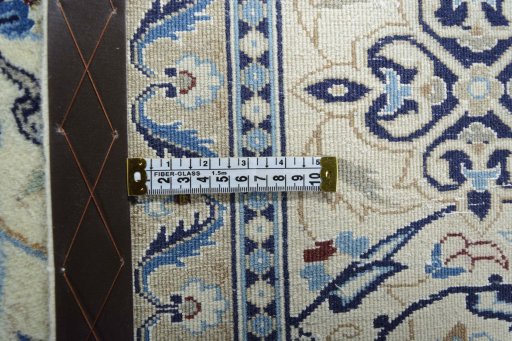 Backside of handmade 2000s Nain rug showing knot structure and weave density