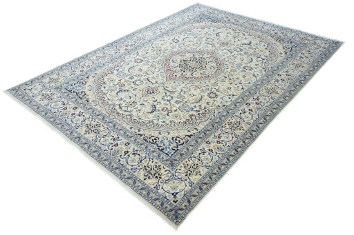 Corner detail of 2000s Nain rug showing border pattern and Wool pile