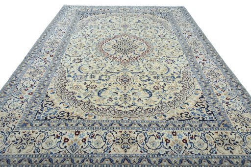 Surface texture of 2000s Nain rug with natural Wool and intricate pattern