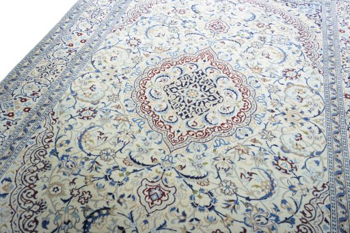 Backside of handmade 2000s Nain rug showing knot structure and weave density