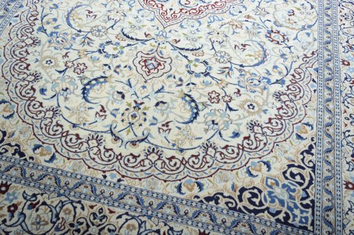 Close-up detail of 2000s Nain rug from Iran / Persia showing Wool weave