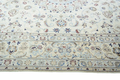 Corner detail of New Nain rug showing border pattern and Wool pile