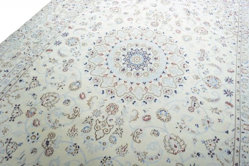 Backside of handmade New Nain rug showing knot structure and weave density