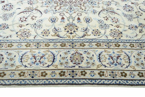 Corner detail of New Nain rug showing border pattern and Wool pile