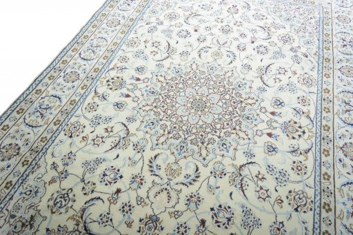Backside of handmade New Nain rug showing knot structure and weave density