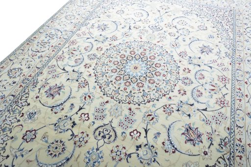 Backside of handmade New Nain rug showing knot structure and weave density