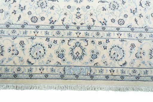 Full view of New Nain rug from Iran / Persia, 302 × 197 cm in Beige tones