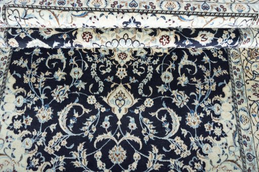 Close-up detail of New Nain rug from Iran / Persia showing Wool weave