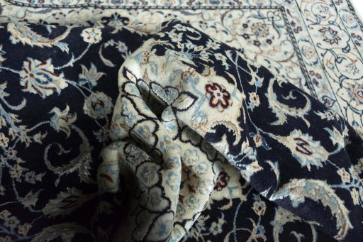 Surface texture of New Nain rug with natural Wool and intricate pattern