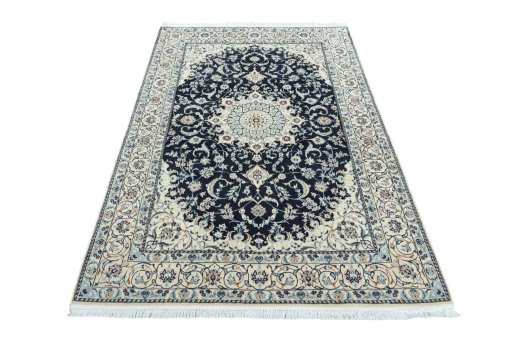 Surface texture of New Nain rug with natural Wool and intricate pattern