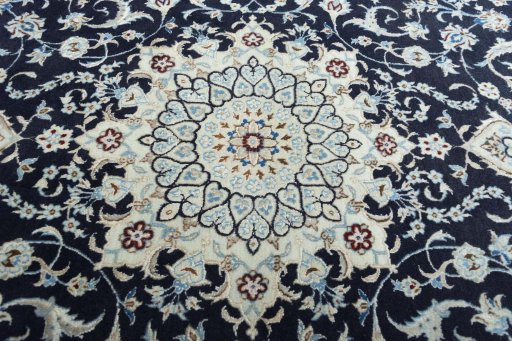 Central medallion detail of New Nain rug from Iran / Persia