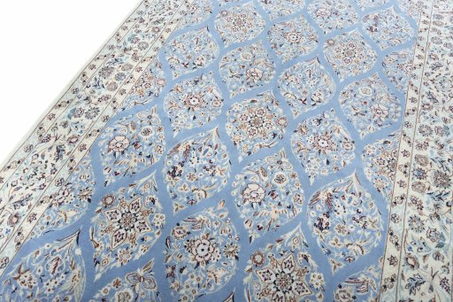 Backside of handmade New Nain rug showing knot structure and weave density