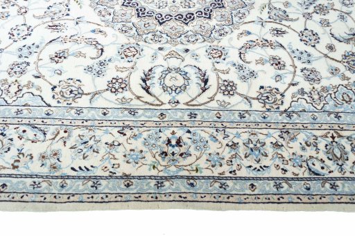 Corner detail of New Nain rug showing border pattern and Cork pile