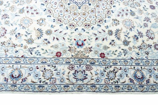 Corner detail of New Nain rug showing border pattern and Wool pile