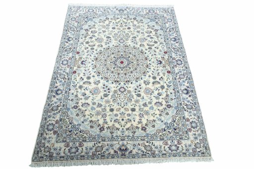 Surface texture of New Nain rug with natural Wool and intricate pattern