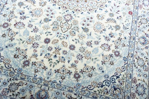 Close-up detail of New Nain rug from Iran / Persia showing Wool weave