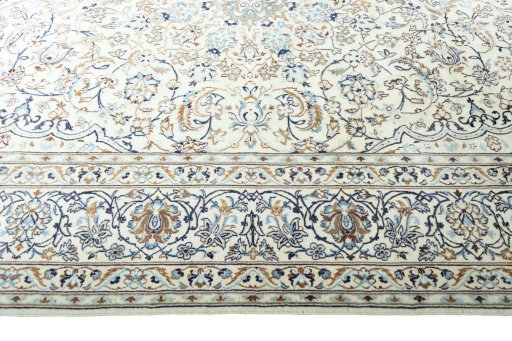 Corner detail of New Nain rug showing border pattern and Wool pile