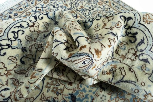 Surface texture of New Nain rug with natural Wool and intricate pattern