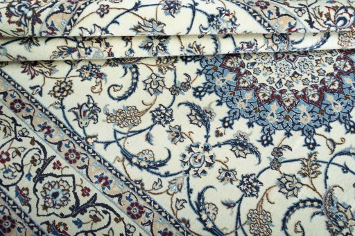 Surface texture of New Nain rug with natural Wool and intricate pattern