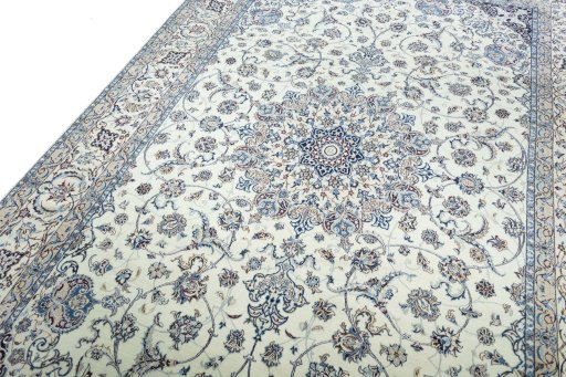 Backside of handmade New Nain rug showing knot structure and weave density