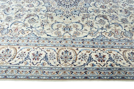 Corner detail of New Nain rug showing border pattern and Wool pile