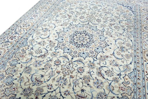 Backside of handmade New Nain rug showing knot structure and weave density